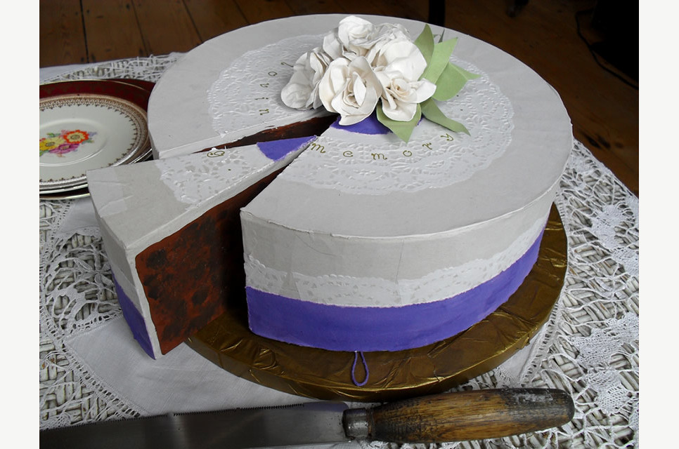 27. Traditional funeral cake with slice to share